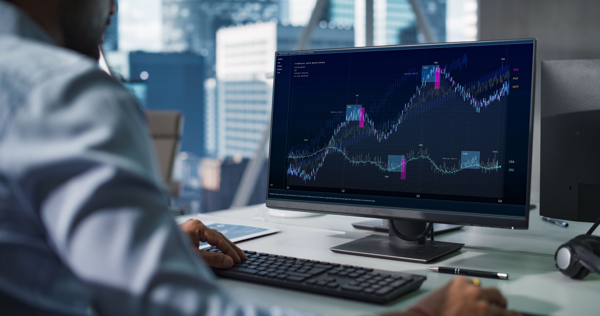 Hedge Fund Office: Indian Financial Analyst Using Computer with Display Showing Real-Time Stocks, Exchange Market Charts. Hard Working South Asian Trader Making Profitable Trade.